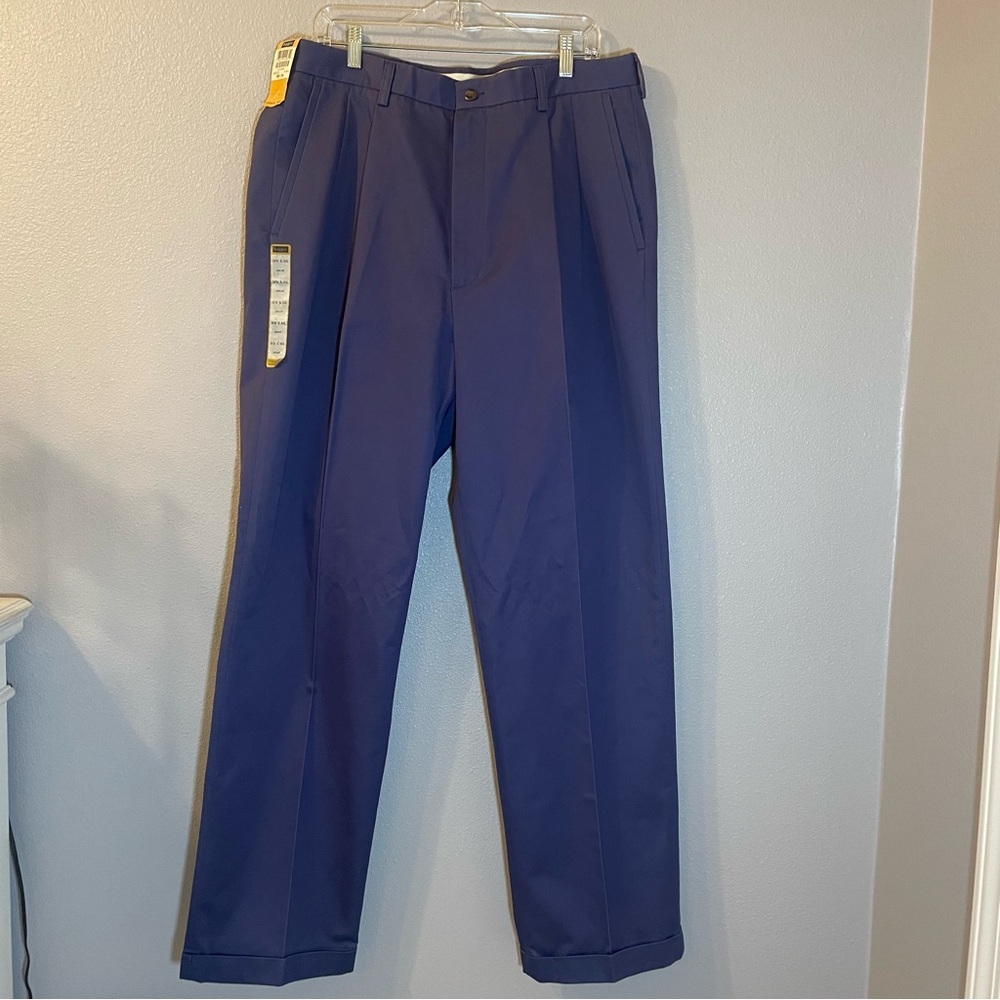 Haggar blue indigo Dress Pants. Pleat cuff. NEW. Size 38waist/34 length. No iron